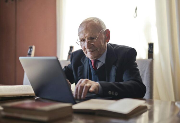 Senior using Laptop